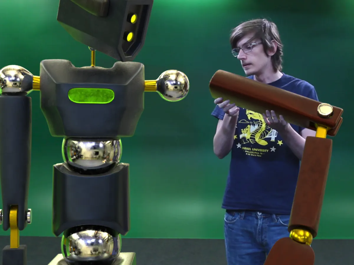 A student working to position an arm on a character in a motion capture project