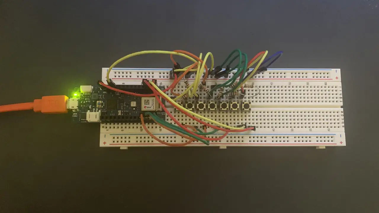 Breadboard with Arduino, wires, and buttons, showing the layout of the project.